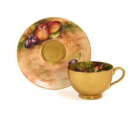 A Royal Worcester Porcelain Cup and Saucer, by Edward Townsend and Thomas Lockyear, 1930, painted with still lifes of fruit o