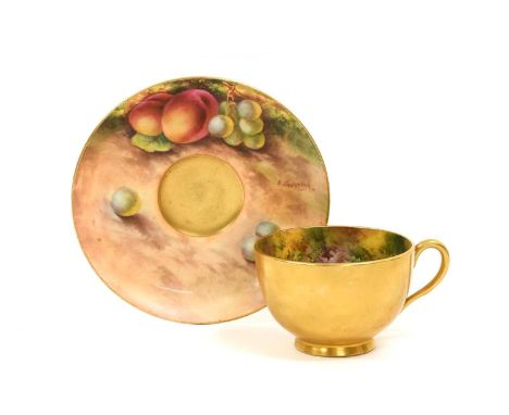 A Royal Worcester Porcelain Cup and Saucer, by Edward Townsend and Harry Ayrton, 1928 and 1930, painted with still lifes of f