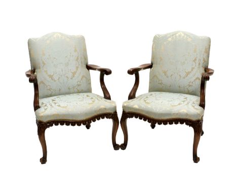 A Pair of George III Chippendale-Style Carved Mahogany Open Armchairs, early 20th century, covered in duck egg blue and gold 