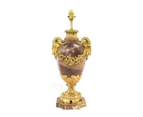 A French Gilt Metal-Mounted Breche Violette Marble Lamp Base, in Louis XVI style, of ovoid form, the goat's mask handles hung