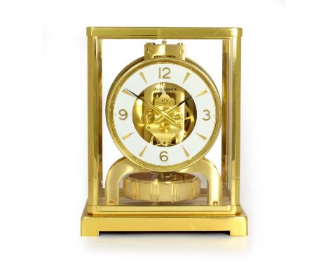 A Brass Atmos Clock, signed Jaeger LeCoultre, No.489416, 20th Century, five glass panel case, stop/start lever positioned abo