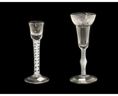 A Cordial Glass, circa 1760, the semi-fluted rounded funnel bowl on an opaque twist stem16.5cm highA Similar Ale Glass, the p