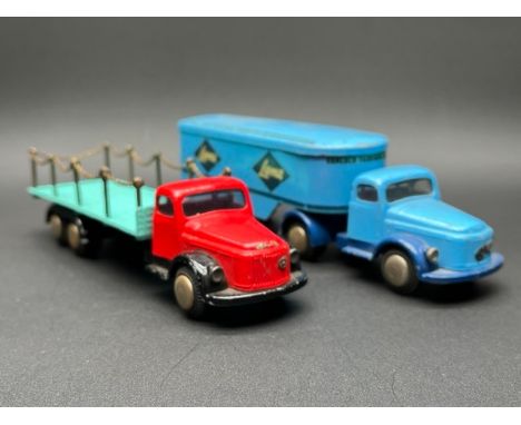 Two Tekno Volvo trucks - vintage Made in Denmark(800g)Tekno 433 Volvo lumber truck, few scratches, Volvo sign to front scratc