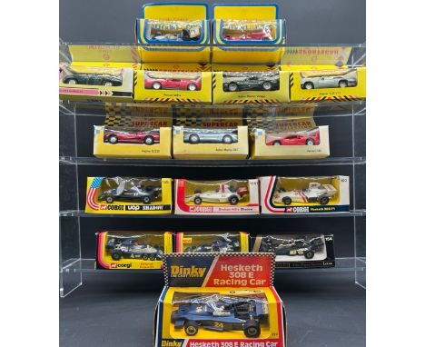 Six Corgi and a Dinky F1 boxed racing cars with(2300g)two Universal F1 cars, four Shell Sports Cars and three Maisto Supercar