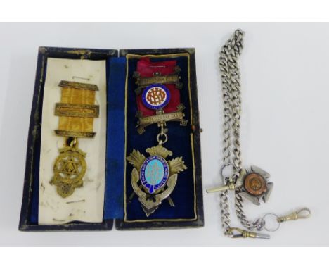 Silver and enamel Masonic medallion together with another with London silver hallmarks and a silver fob on a white metal Albe