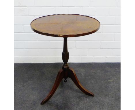 Mahogany and inlaid Georgian style wine table with an oval top raised on a baluster column and tripod supports, 44 x 54 x 37c