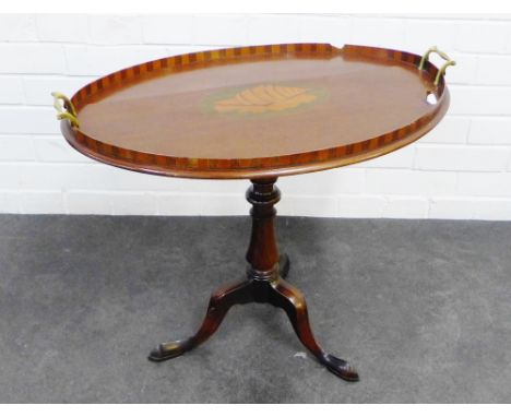 Mahogany and inlaid butlers style tray top table with inlaid shell paterae, brass handles, baluster column and tripod support