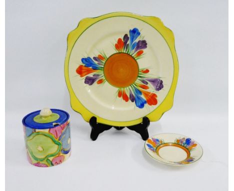 Clarice Cliff 'Crocus' patterned cake plate and saucer, together with a Clarice Cliff Bizarre 'Melons' patterned preserve jar