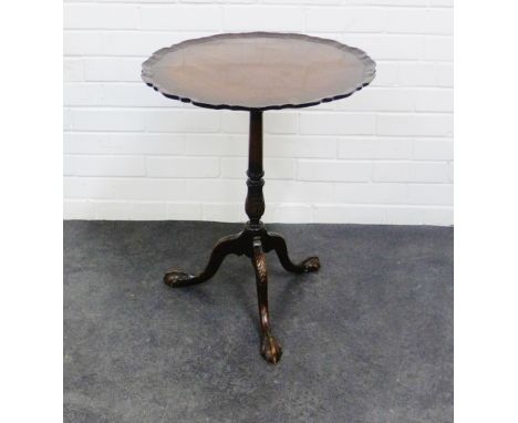 Mahogany pie crust table, the circular top on a carved baluster column and tripod legs with claw feet, 64 x 53cm 