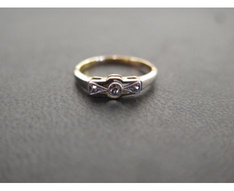 A Deco style diamond ring - Stamped 18ct - Ring size I 1/2 - Weight approx 1.9gms
Condition Report: Good - With light scratch