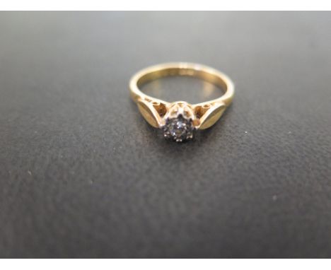 A diamond single-stone ring - The brilliant-cut diamond within an illusion setting to the plain band - Stamped 18ct - Ring si