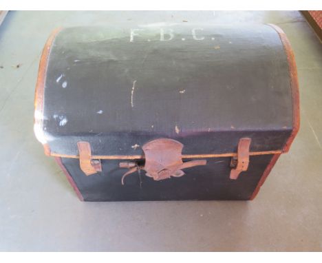 A black canvas on wicker dome top trunk 