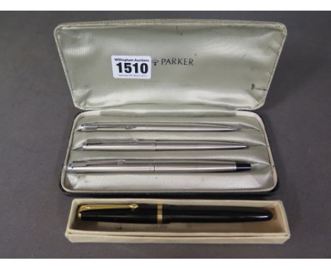A Parker 45 pen and pencil set and a Conway 57 ink pen