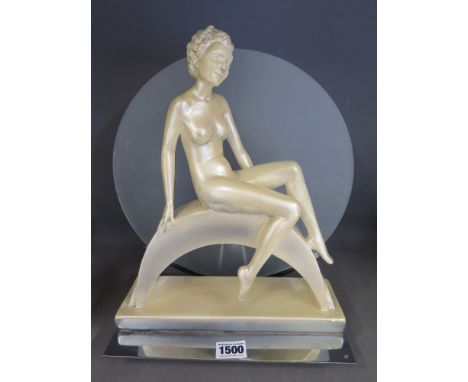An Art Deco later plaster lady on a later chrome and frosted glass lamp base - Height 35 cm x Width 29 cm