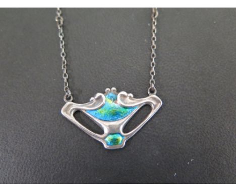 CHARLES HORNER a silver and enamel pendant - Suspended from a belcher-link chain - Hallmarked Chester 1908 - Length 49cms - W