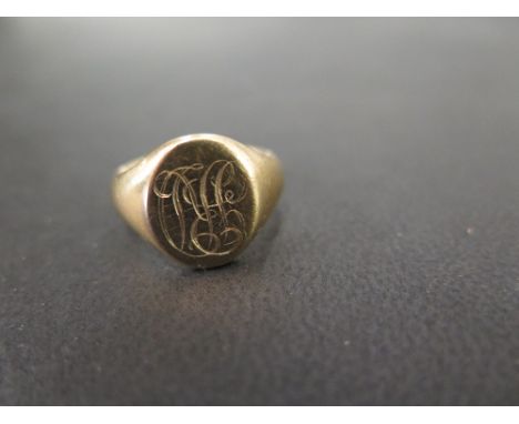 A 9ct gold signet ring - With monogram engraving - Hallmarked Birmingham - Ring size O 1/2 - Weight approx 8.2gms
Condition R