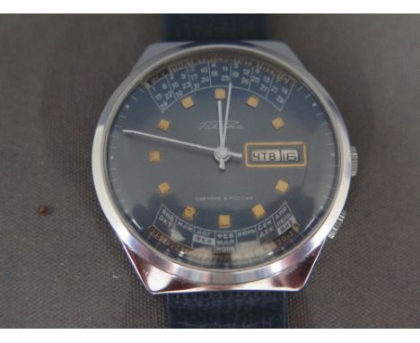 A Russian manual wind Gents calendar watch - Diameter 4 cm 
Condition report: Working in saleroom 