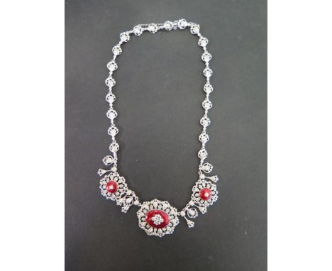 A silver, enamel and paste necklace - Hallmarked London - Length 42cms - Weight approx 1.9ozt
Condition Report: Good - With l