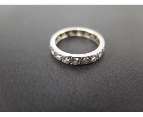 A brilliant-cut diamond full-circle band ring - Estimated total diamond weight 1ct - Tests as gold - Ring size K 1/2 - Weight