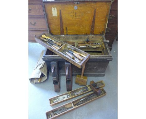 A good Carpenters tool chest with a collection of moulding planes, chisels, spoke shaves and other tools to R Ash - including