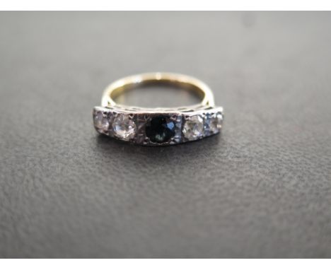 An early to mid 20th century 18ct gold old-cut diamond and sapphire five-stone ring - Estimated total diamond weight 0.70ct -