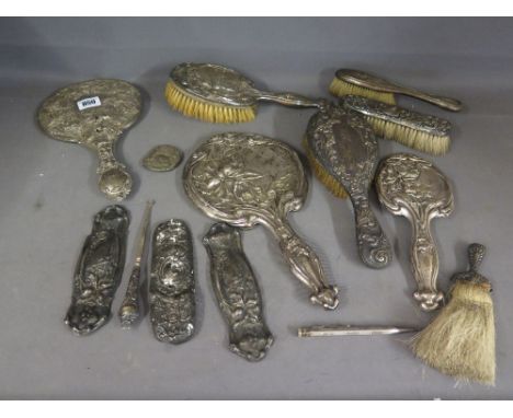 A collection of thirteen pieces of silver backed dressing table pieces - all damaged or missing pieces, a silver pencil and a