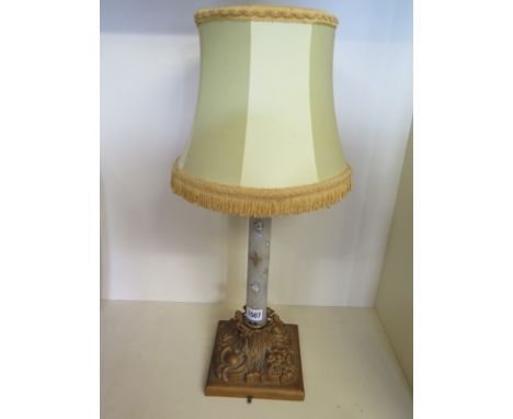 An ormolu mounted table lamp with a decorated frosted glass column - Height 59 cm - including shade
Condition report:  Needs 