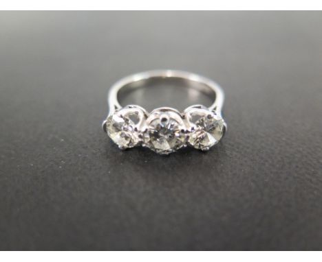 A brilliant-cut diamond three-stone ring - Estimated total diamond weight 1.85cts - Estimated K-L colour, SI1-SI2 clarity - S