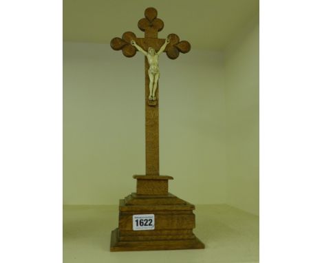 A Continental oak and ivory Crucifix on plinth, stamped Hilereau J B 1908 carved ivory figure of Christ - measures 11.5 cm ov