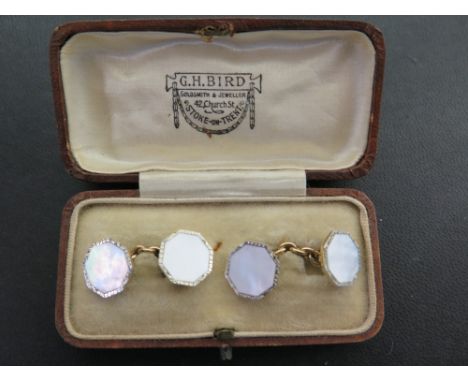 A pair of bi-colour mother of pearl cufflinks - Stamped 9ct & 18ct - Weight approx 5.7gms
Condition Report: Good - With some 