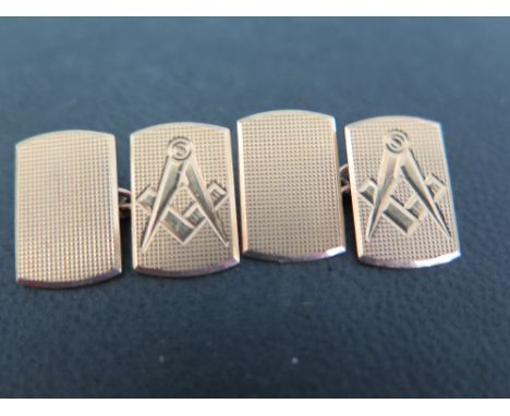 A pair of 9ct gold cufflinks with Masonic symbol - Hallmarked London - Weight approx 6.7gms
Condition Report: Good - With lig