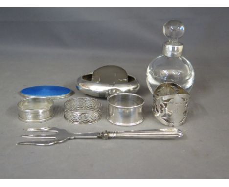 A collection of silver and silver plate including silver top scent bottle, four napkin rings, break fork, enamel and silver m