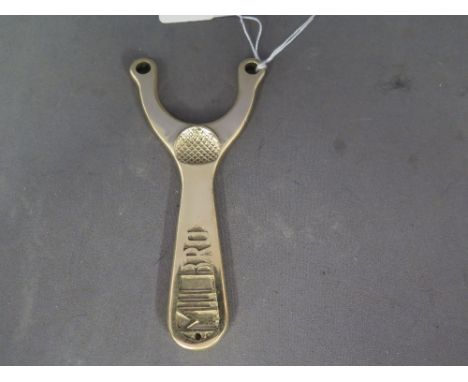 A vintage Milbro brass catapult/slingshot