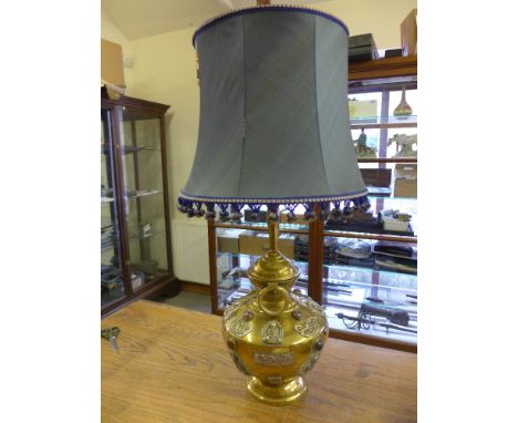 An Eastern brass twin handled lidded vase inset with agate roundel's now converted to a table lamp - Height 78cm 