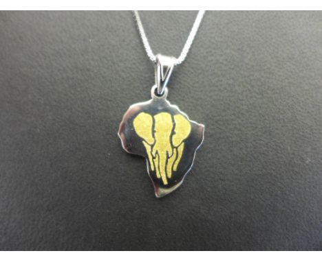 A pendant in the shape of Africa depicting an elephant - Stamped Pt - Length 3.4cms - Weight approx 12.0gms - Suspended from 