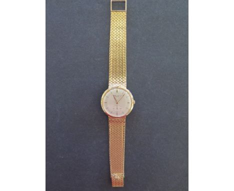 Patek Philippe Calatrava 18 ct gold Gentleman's wristwatch - with original integral 18 ct gold bracelet and clasp, baton hand