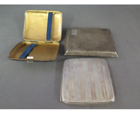 Three early 20th century silver cigarette cases - Birmingham 1928, 1922  and 1929 - two with monograms 
Condition report: Sur
