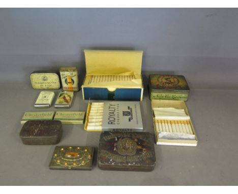 A collection of thirteen vintage cigarette tins and packets some with contents