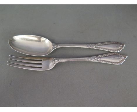 A decorative Victorian silver serving spoon and fork - Hallmarked London 1860 - Maker stamp G A - George Adams for Chawner & 