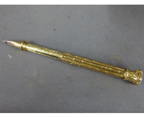 A gold plated propelling pencil and pen
Condition report: - needs attention