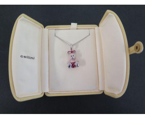 An enamel teddy-bear pendant with gem-set eyes - Suspended from a fancy-link chain - Length of pendant 3cms - Length of chain