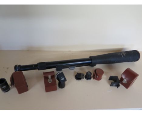 A vintage Hertely & Reuss 25-60 x 60 zoom draw Telescope with tripod mount and accessory eyepieces 