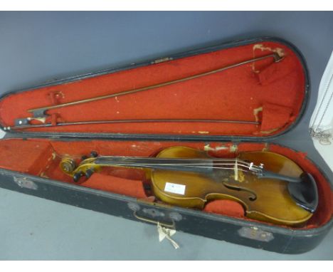A copy of an Antonious Stradivarius violin with a single piece 13" back