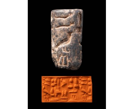 Old Kingdom, Dynasty IV-V, Ca. 2613 - 2345 BC. A cylinder seal pierced longitudinally. The surface is engraved with hieroglyp