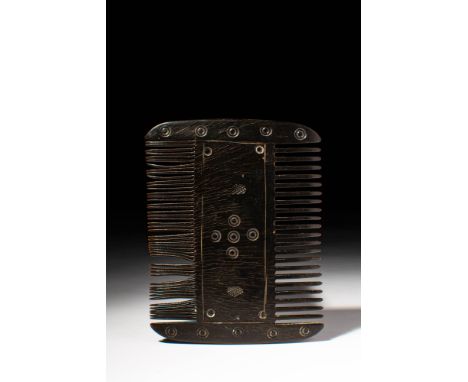 Coptic Culture, Ca. 100 BC - AD 100 .A wooden comb with a decorative program consisting of nine concentric circles on a centr