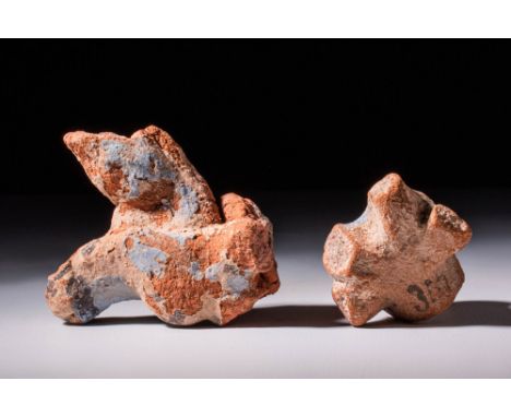 Amarna Period, Ca. 1353 - 1336 BC.A pair of terracotta statues of ibex made with red clay and moulded. Each ibex body is idea