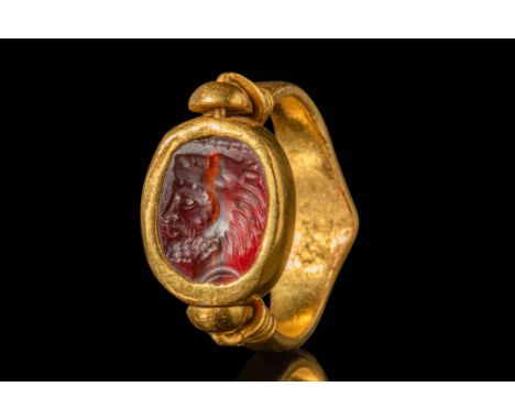Early Classical Period, Ca. mid 5th century BC.A red stone intaglio depicting Hercules as a bearded male figure in profile, w