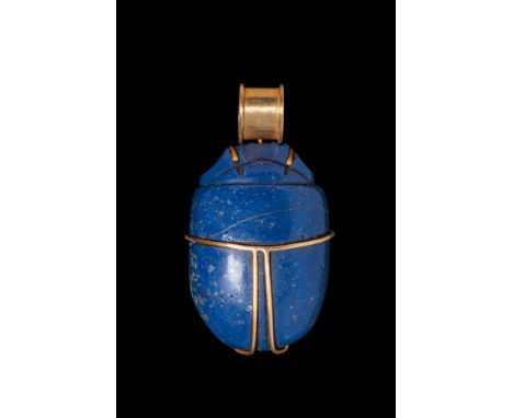 Late Period, Ca. 664 - 332 BC.A large blue scarab of a deep cobalt hue with a smooth, rounded dorsal surface. The elytra are 