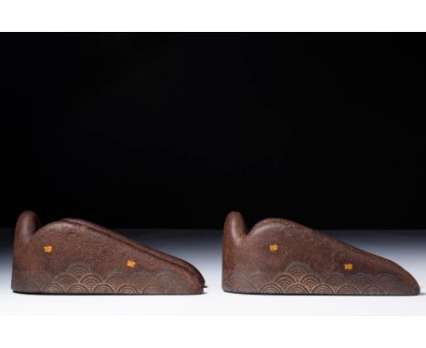 Ca. 2000 - 1000 BC.A pair of stone weights in the form of stylised ducks, each with a rounded body tapering into an elongated