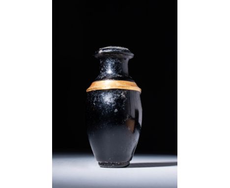 New Kingdom, Ca. 1550 - 1069 BC.An obsidian vessel composed of a body decorated with a gold band at the shoulders. The body h